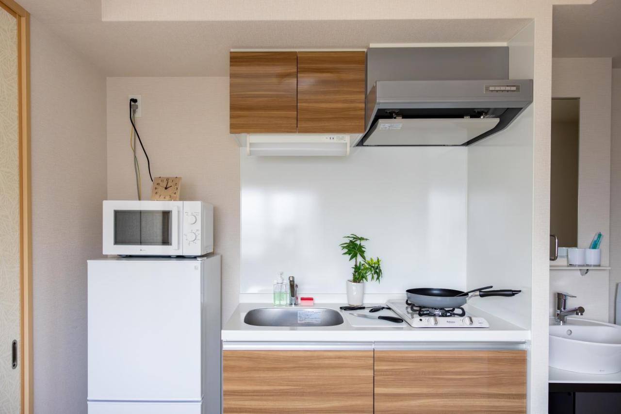 Rewit Building Apartment Осака Екстериор снимка