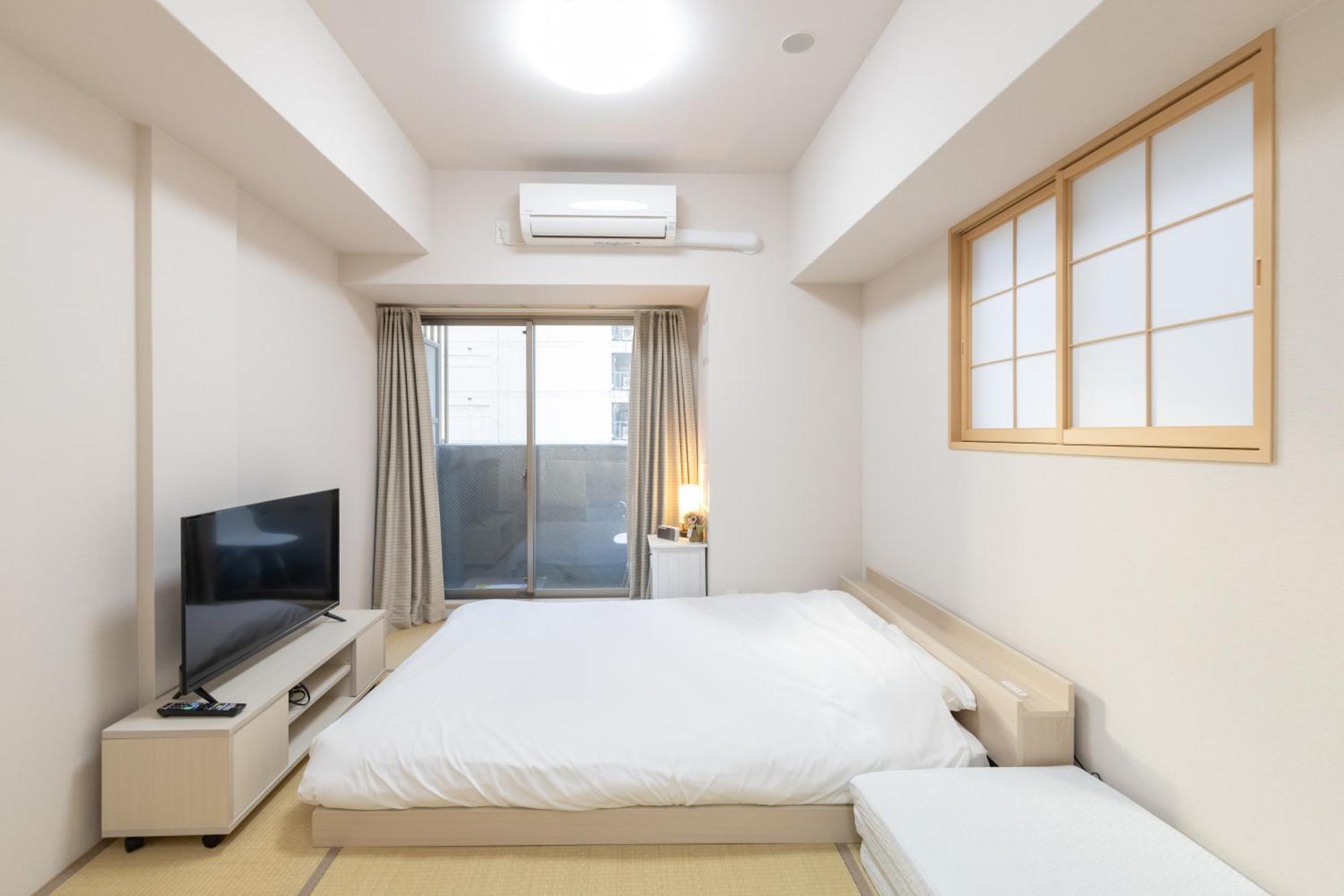 Rewit Building Apartment Осака Екстериор снимка